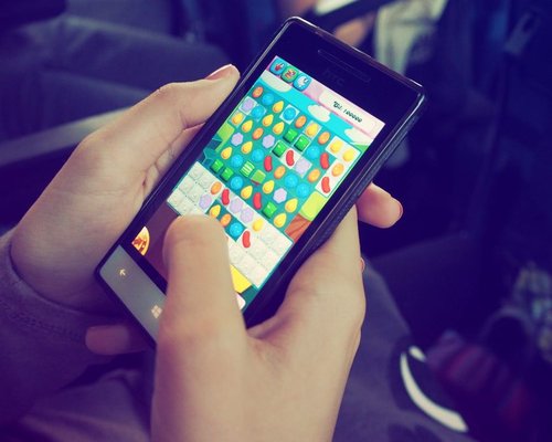 Smartphone presenting a fictional beginner-friendly gaming interface