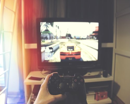 Contemporary gaming controllers displayed in a showcase environment